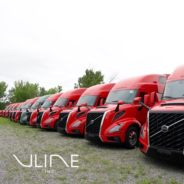 Real V-Line red Volvo fleet lined up at the yard